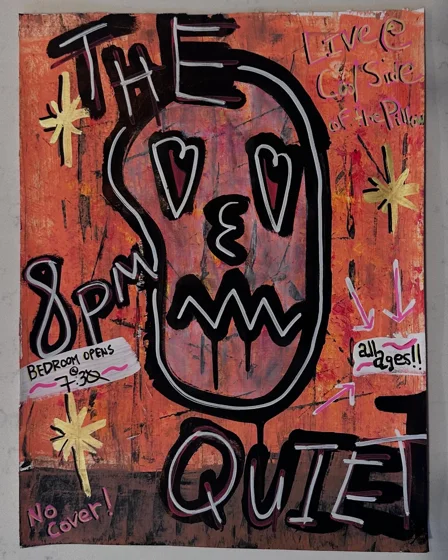 No. 22. A large black outlined face with heart-shaped eyes and a jagged mouth, surrounded by handwritten words and star-like marks on red-orange.