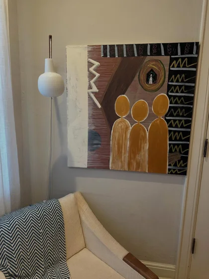 No. 97. Three golden figures beneath a small oval eye, with geometric marks on a brown and black background.