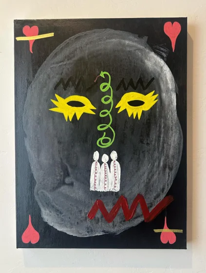 No. 103. A large gray oval face with yellow eyes, a green spiral, and three small white figures, surrounded by red hearts on black.